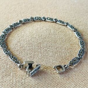Elegant Silver Bracelet with Intricate Design